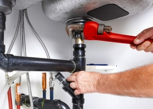 Installation de siphon sur l'évier